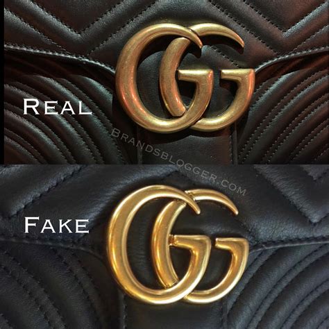 real gucci handbags vs fake|inside a real gucci bag.